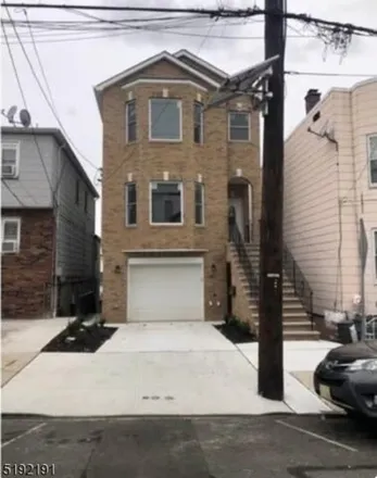 Rent this 3 bed house on 487 Liberty Avenue in Jersey City, NJ 07307
