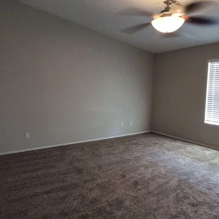 Rent this 4 bed apartment on 10528 West Pomo Street in Phoenix, AZ 85353
