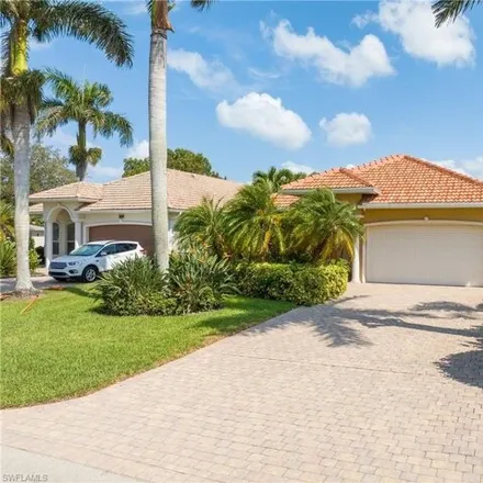 Buy this 3 bed house on 607 104th Ave N in Naples, Florida