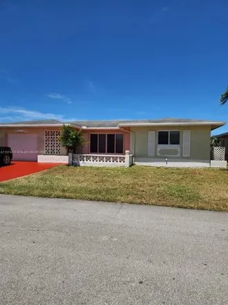 Buy this 2 bed house on 6807 Northwest 58th Court in Tamarac, FL 33321