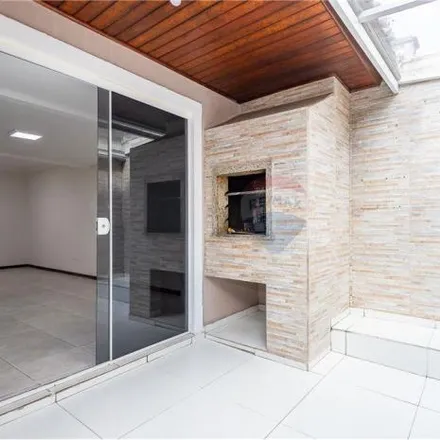 Rent this 3 bed house on Rua Fioravante Slavieiro 812 in Novo Mundo, Curitiba - PR