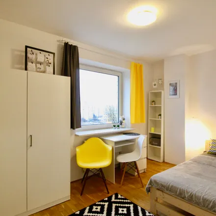 Rent this 5 bed room on Aleja Jana Pawła II 70 in 00-175 Warsaw, Poland