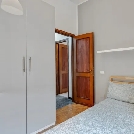 Rent this 6 bed room on Ristorante Pizzeria Aurora in Via Curtatone, 21