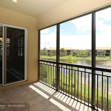 Rent this 3 bed apartment on 8402 Northwest 127th Lane in Parkland, FL 33076