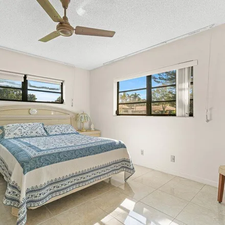 Rent this 2 bed apartment on 10499 Quailwood Lane in Country Club Trail, Palm Beach County