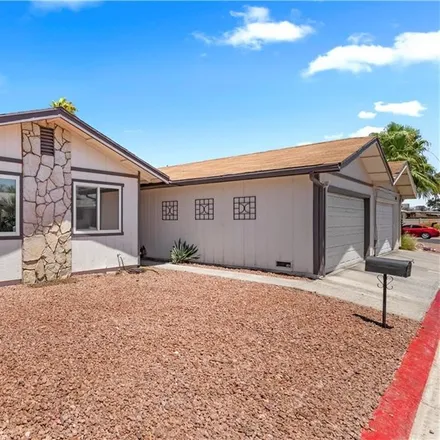 Buy this 3 bed townhouse on 4871 Benecia Way in East Las Vegas, Whitney