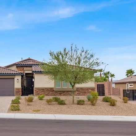 Buy this 4 bed house on 10420 Amulet Ridge Court in Las Vegas, NV 89149
