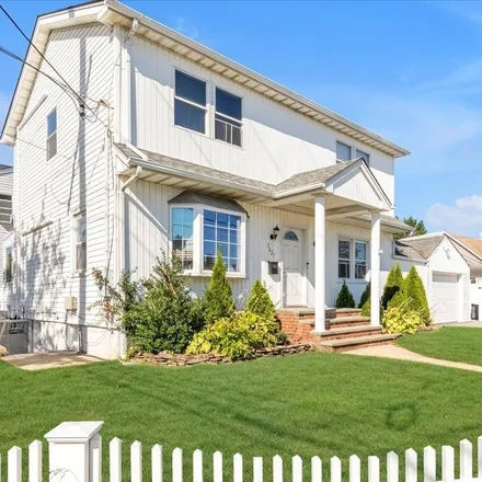 Buy this 4 bed house on 2427 Washington Boulevard in North Bellmore, NY 11710