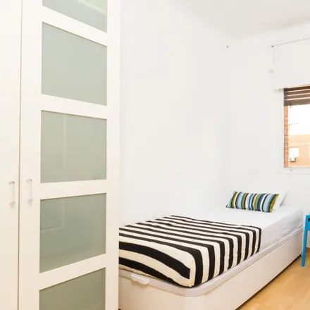 Rent this 6 bed room on Madrid in Calle de Pedro Unanue, 8