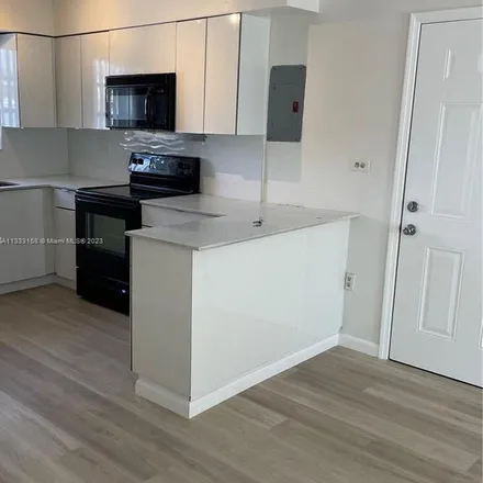 Rent this 2 bed apartment on 1057 Southwest 7th Street in Latin Quarter, Miami