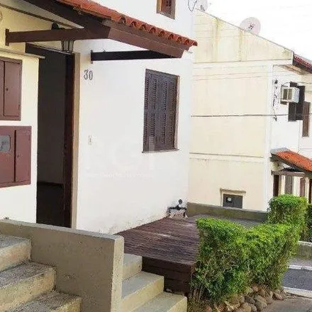 Buy this 3 bed house on Avenida Monte Cristo in Vila Nova, Porto Alegre - RS