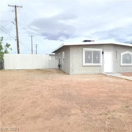 Buy this 4 bed house on 2664 East Ferguson Avenue in North Las Vegas, NV 89030