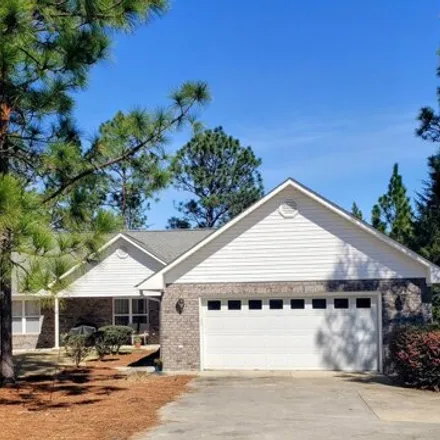 Buy this 3 bed house on 66 Forest Lake Court in Foxfire, Moore County
