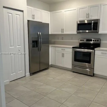 Rent this 4 bed apartment on 23799 Southwest 117th Avenue in Princeton, FL 33032