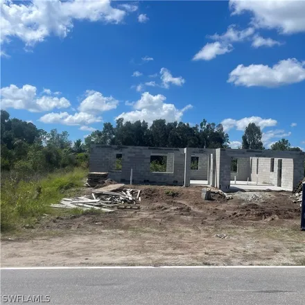 Buy this 3 bed house on 3219 40th Street Southwest in Lehigh Acres, FL 33976