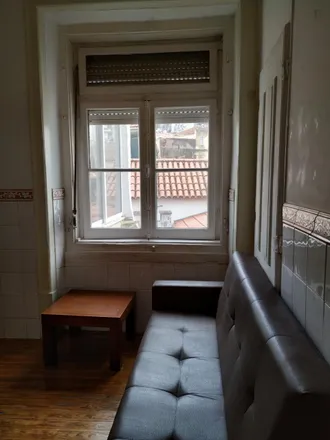 Rent this 4 bed apartment on Farmácia Bastos de Andrade in Calçada de Santo André 109, 1100-495 Lisbon