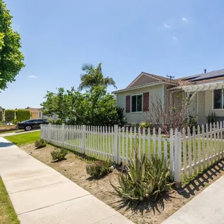 Buy this 5 bed house on 4239 Hackett Avenue in Lakewood, CA 90713