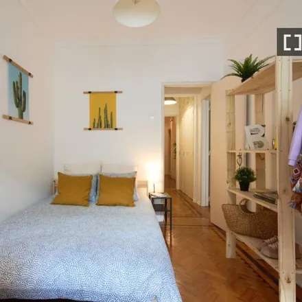 Rent this 3 bed room on Rua António Pereira Carrilho 28 in 1000-047 Lisbon, Portugal