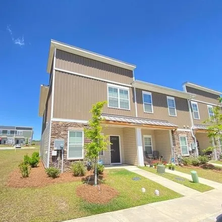 Rent this 3 bed townhouse on 3 Grayson Grove Ct in Columbia, South Carolina