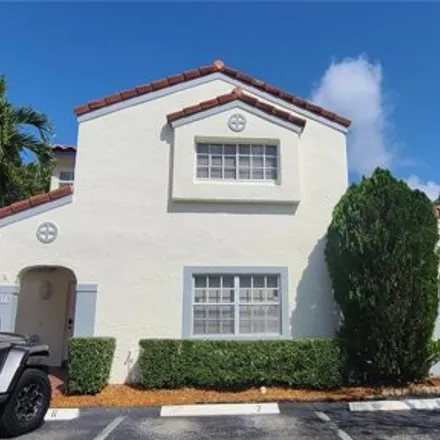 Rent this 3 bed house on 1373 Cottonwood Circle in Weston, FL 33326