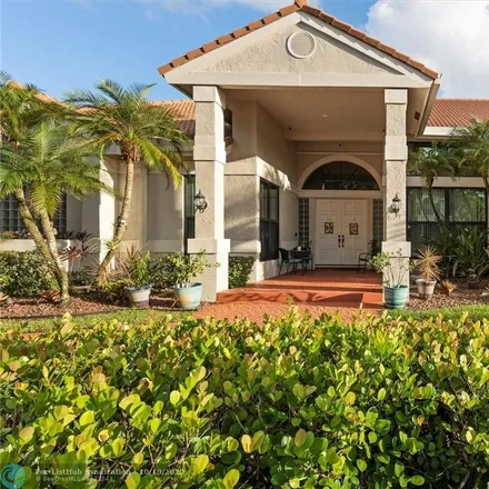 Buy this 5 bed house on 11944 Winged Foot Terrace in Coral Springs, FL 33071