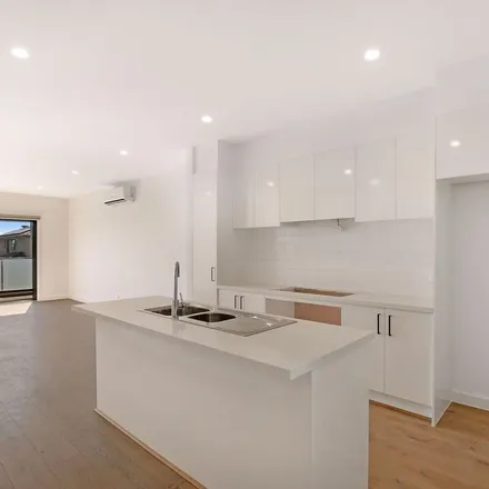 Rent this 2 bed townhouse on Mullavey Place in Werribee VIC 3030, Australia