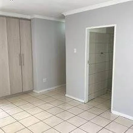 Rent this 2 bed townhouse on 3rd Avenue in Kew, Johannesburg