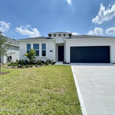 Rent this 4 bed house on Roygaris Street Northwest in Palm Bay, FL