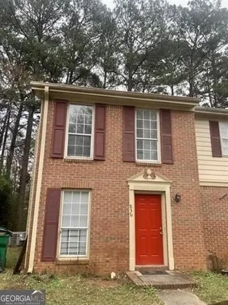 Rent this 2 bed house on 800 Glynn Oaks Drive in Scottdale, GA 30021