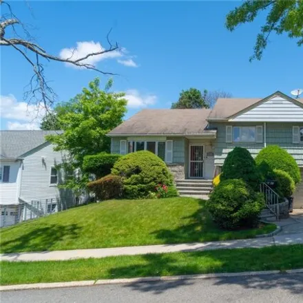 Buy this 4 bed house on 50-61 Morenci Lane in New York, NY 11362