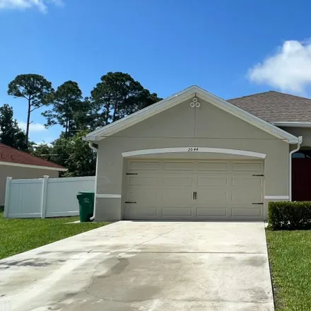 Rent this 4 bed house on 2044 Southwest Kimberly Avenue in Port Saint Lucie, FL 34953