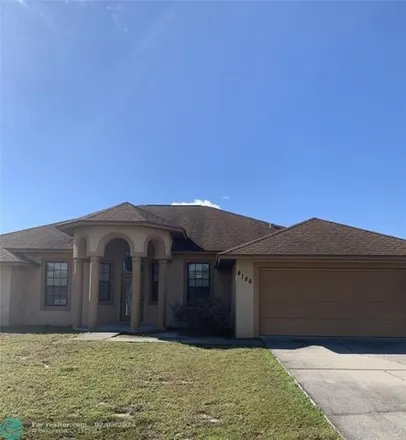 Rent this 4 bed house on 4186 Sw Jarmer Rd in Port Saint Lucie, Florida