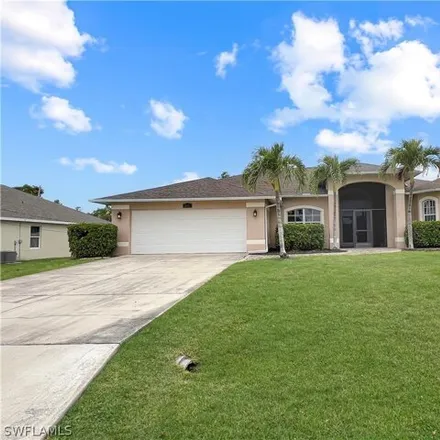 Rent this 3 bed house on 887 Northwest 2nd Street in Cape Coral, FL 33993