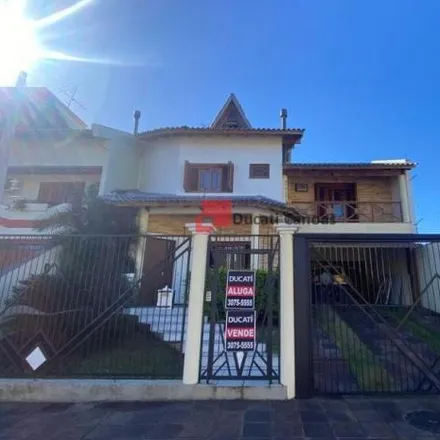 Rent this 5 bed house on Rua Letônia in Marechal Rondon, Canoas - RS