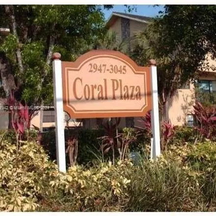 Rent this 1 bed condo on 3083 Riverside Drive in Coral Springs, FL 33065