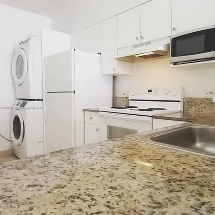 Rent this 2 bed apartment on 7-Eleven in 1 West Flagler Street, Miami