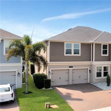 Rent this 5 bed house on 10346 Lovegrass Lane in Orange County, FL 32832