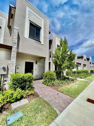 Rent this 3 bed townhouse on 1241 Northeast 208th Terrace in Ives Estates, Miami-Dade County