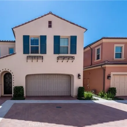 Rent this 3 bed condo on 119 Plum Lily in Irvine, California
