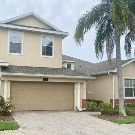 Rent this 4 bed townhouse on 1269 Ballinton Drive in Viera, FL 32940