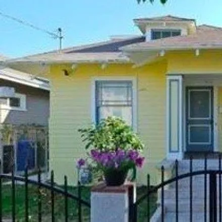 Buy this 4 bed house on 1614 West 24th Street in Los Angeles, CA 90007