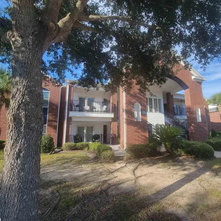 Buy this 2 bed townhouse on Magnolia by the Gulf Animal Clinic in 19930 Oak Road West, Gulf Shores