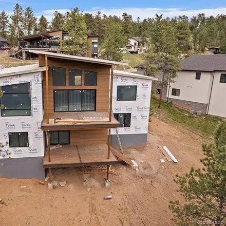 Buy this 5 bed house on 5370 South Cubmont Drive in Evergreen, CO 80439