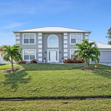 Buy this 4 bed house on 1618 Southwest McAllister Lane in Port Saint Lucie, FL 34953