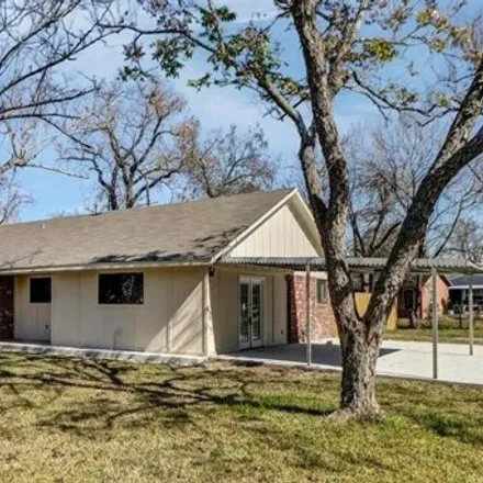 Rent this 4 bed house on 514 Ross Street in Dayton, TX 77535