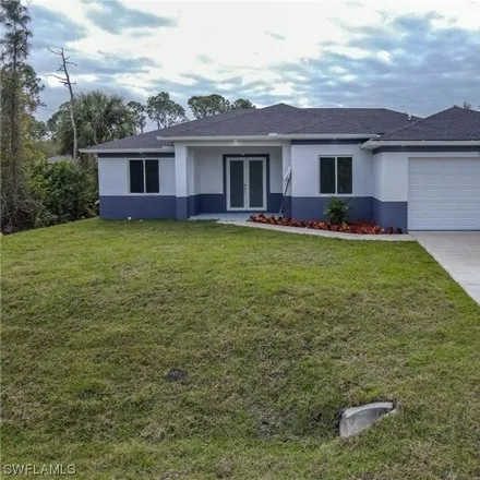 Buy this 4 bed house on Central Street in Lehigh Acres, FL 33974