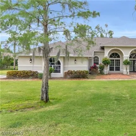 Buy this 3 bed house on 11499 Salix Court in Lee County, FL 33966