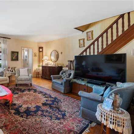 Buy this 4 bed townhouse on 271 92nd Street in New York, NY 11209