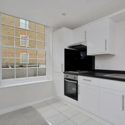 Rent this 1 bed apartment on African Queen Fabrics Ltd in 32 Wentworth Street, Spitalfields