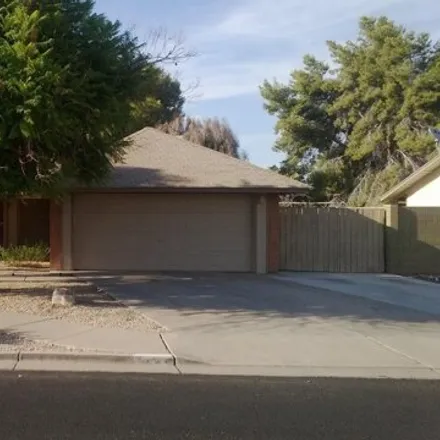 Rent this 3 bed house on 1734 West Natal Avenue in Mesa, AZ 85202